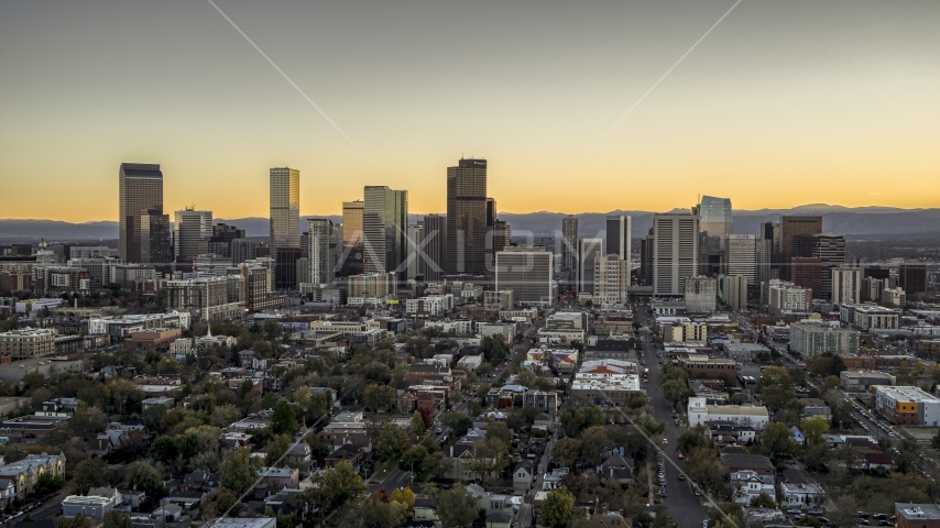 Wide view of skyscrapers in the city's downtown skyline at sunset, Downtown Denver, Colorado Aerial Stock Photo DXP001_000184 | Axiom Images