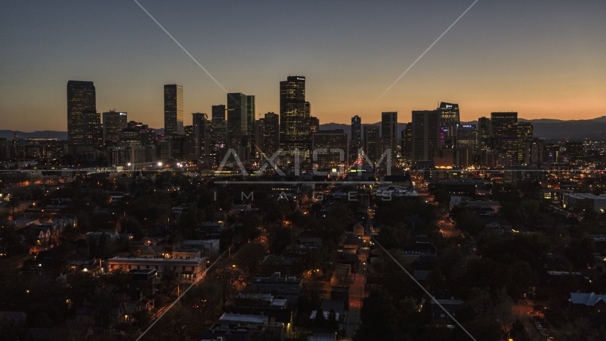 Giant skyscrapers in the city's skyline at twilight, Downtown Denver, Colorado Aerial Stock Photo DXP001_000191 | Axiom Images