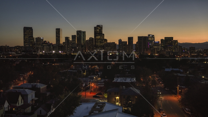 Giant skyscrapers in the city's downtown skyline at twilight, Downtown Denver, Colorado Aerial Stock Photo DXP001_000192 | Axiom Images