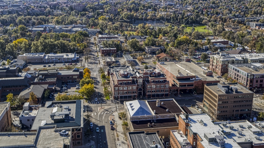Brick office building by a quiet intersection in Boulder, Colorado Aerial Stock Photo DXP001_000196 | Axiom Images