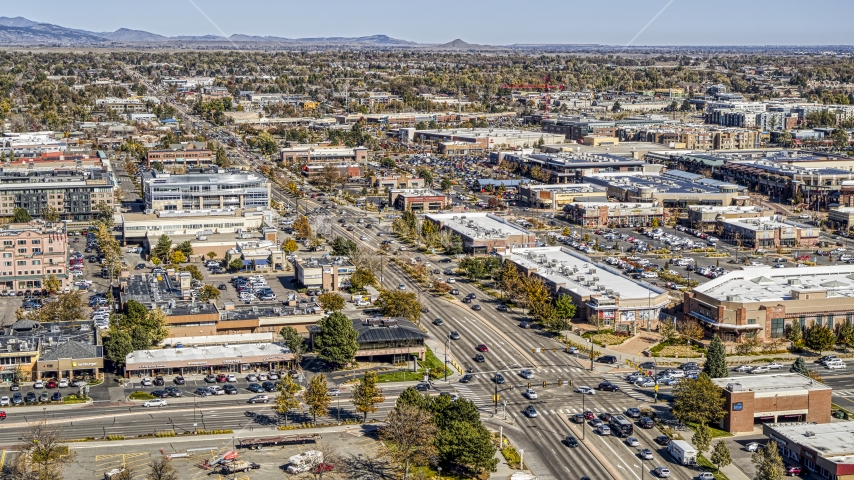 Cars on the wide street by strip malls, Boulder, Colorado Aerial Stock Photo DXP001_000205 | Axiom Images