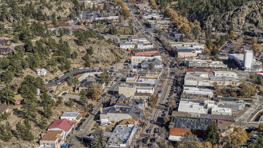 Shops lining a road through Estes Park, Colorado Aerial Stock Photo DXP001_000223 | Axiom Images