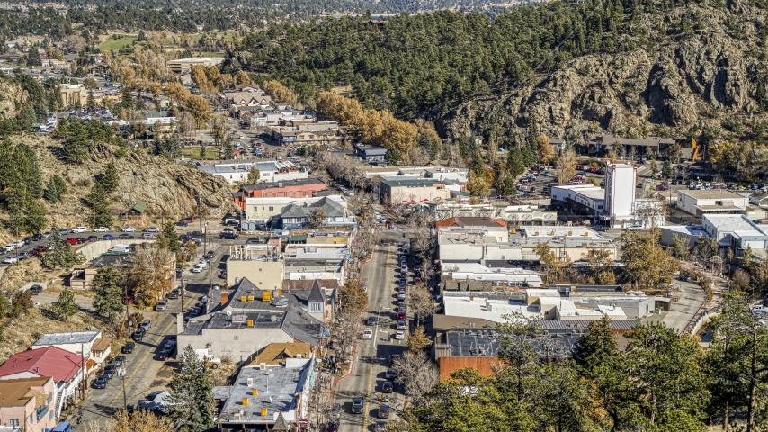 Shops on a road through Estes Park, Colorado Aerial Stock Photo DXP001_000224 | Axiom Images