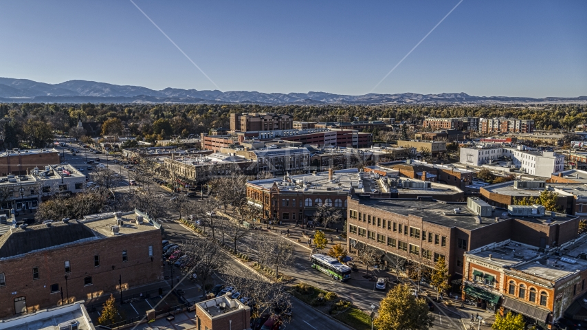 Quiet street by shops and brick office buildings in Fort Collins, Colorado Aerial Stock Photo DXP001_000236 | Axiom Images