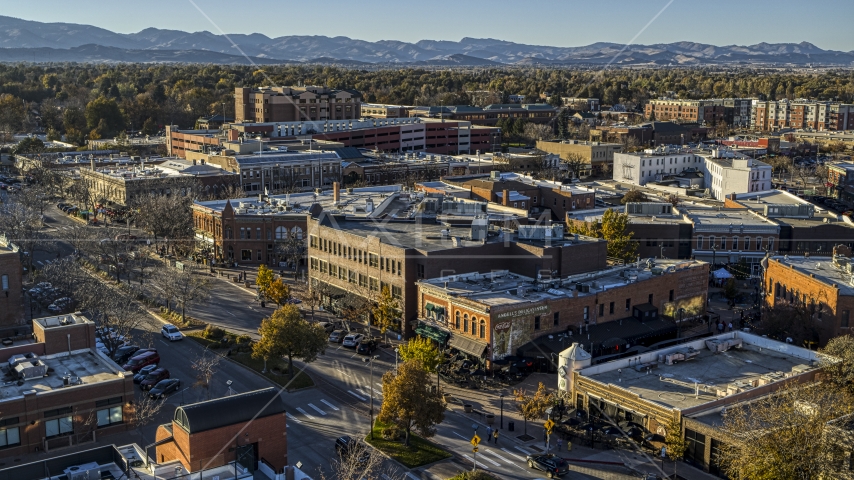 A quiet road with brick office buildings and small shops in Fort Collins, Colorado Aerial Stock Photo DXP001_000244 | Axiom Images