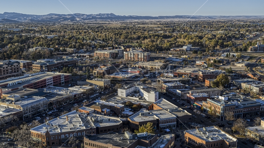 Shops lining a busy town road in Fort Collins, Colorado Aerial Stock Photo DXP001_000251 | Axiom Images