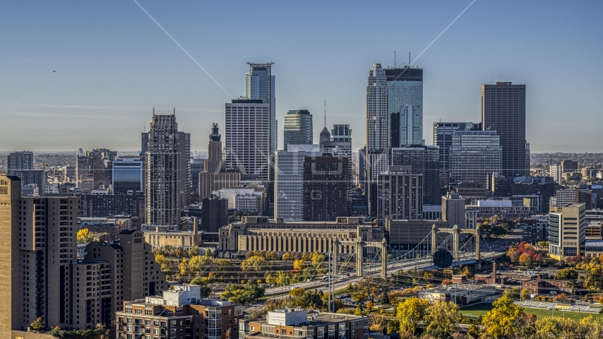 The city skyline seen from near a condo complex at sunrise, Downtown Minneapolis, Minnesota Aerial Stock Photo DXP001_000282 | Axiom Images