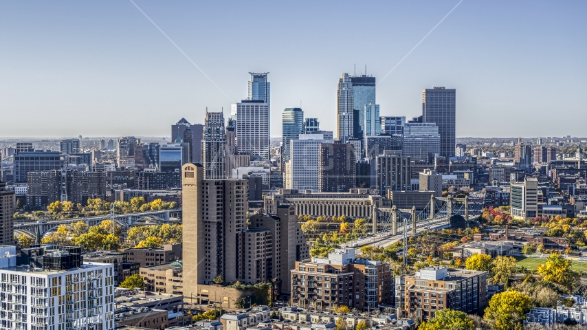 Apartment and condo complexes in the foreground, city skyline in the background, Downtown Minneapolis, Minnesota Aerial Stock Photo DXP001_000287 | Axiom Images