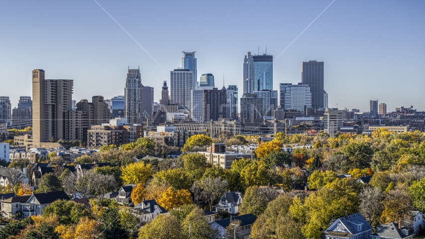 A condominium complex and the city skyline behind it, Downtown Minneapolis, Minnesota Aerial Stock Photo DXP001_000289 | Axiom Images