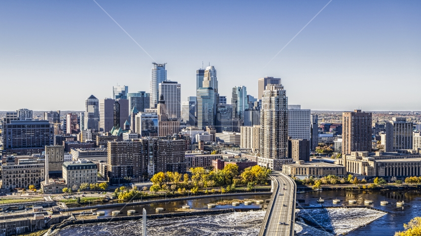 The city skyline seen from a bridge spanning the Mississippi River, Downtown Minneapolis, Minnesota Aerial Stock Photo DXP001_000291 | Axiom Images