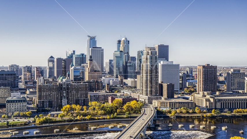 The city skyline seen across a bridge spanning the Mississippi River, Downtown Minneapolis, Minnesota Aerial Stock Photo DXP001_000292 | Axiom Images