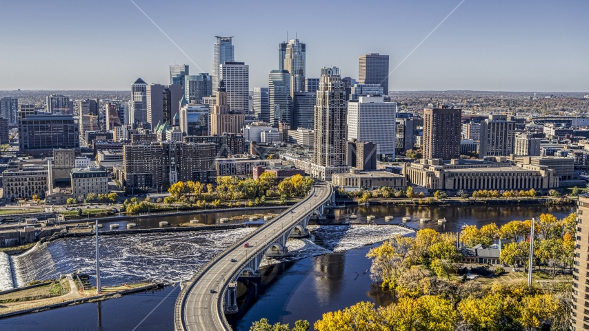 The city's skyline seen from a bridge spanning the Mississippi River, Downtown Minneapolis, Minnesota Aerial Stock Photo DXP001_000297 | Axiom Images