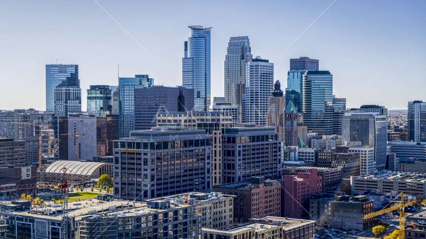 The city's skyline behind office buildings, Downtown Minneapolis, Minnesota Aerial Stock Photo DXP001_000301 | Axiom Images