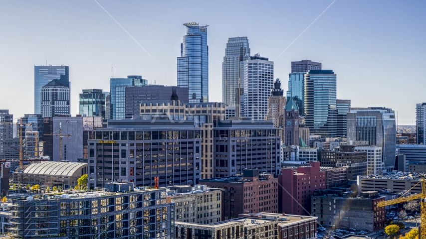 Office buildings with city skyline's skyscrapers in the background, Downtown Minneapolis, Minnesota Aerial Stock Photo DXP001_000302 | Axiom Images