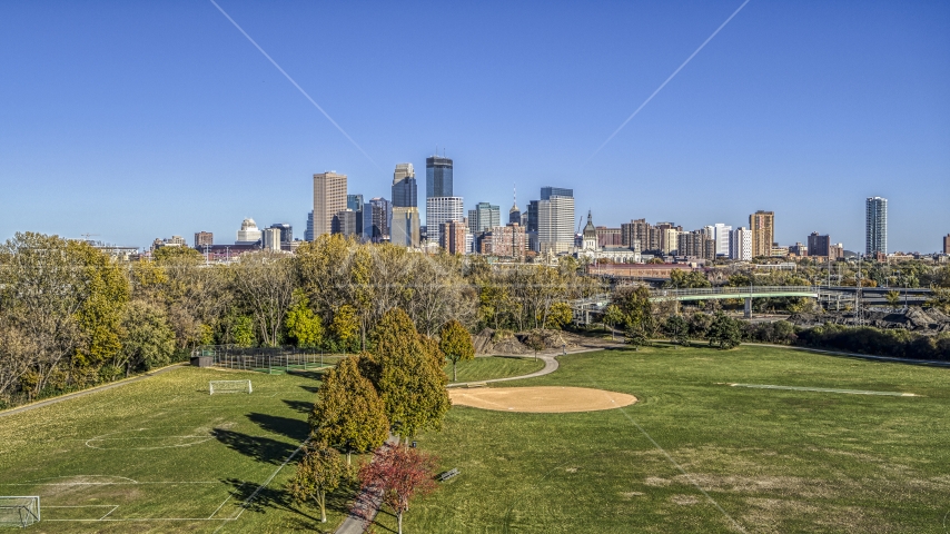 The city skyline's skyscrapers seen from a park, Downtown Minneapolis, Minnesota Aerial Stock Photo DXP001_000304 | Axiom Images