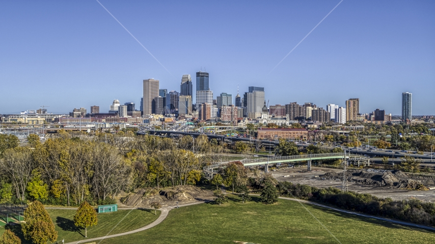 The city's skyline in the distance, seen from a park, Downtown Minneapolis, Minnesota Aerial Stock Photo DXP001_000308 | Axiom Images