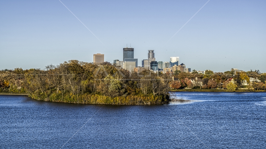 The city skyline's skyscrapers seen from Lake of the Isles, Downtown Minneapolis, Minnesota Aerial Stock Photo DXP001_000316 | Axiom Images