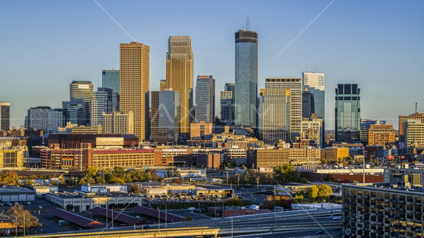 Towering skyscrapers of the city's skyline at sunset in Downtown Minneapolis, Minnesota Aerial Stock Photo DXP001_000323 | Axiom Images