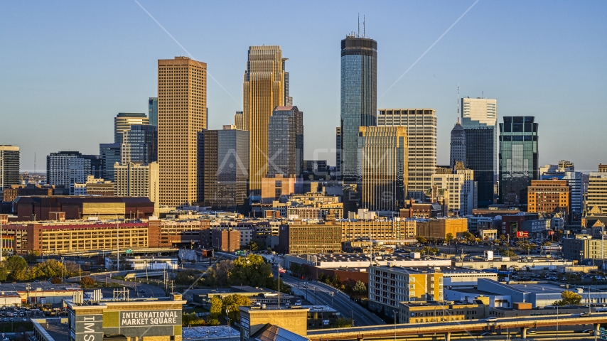 Giant skyscrapers of the city's skyline at sunset in Downtown Minneapolis, Minnesota Aerial Stock Photo DXP001_000324 | Axiom Images