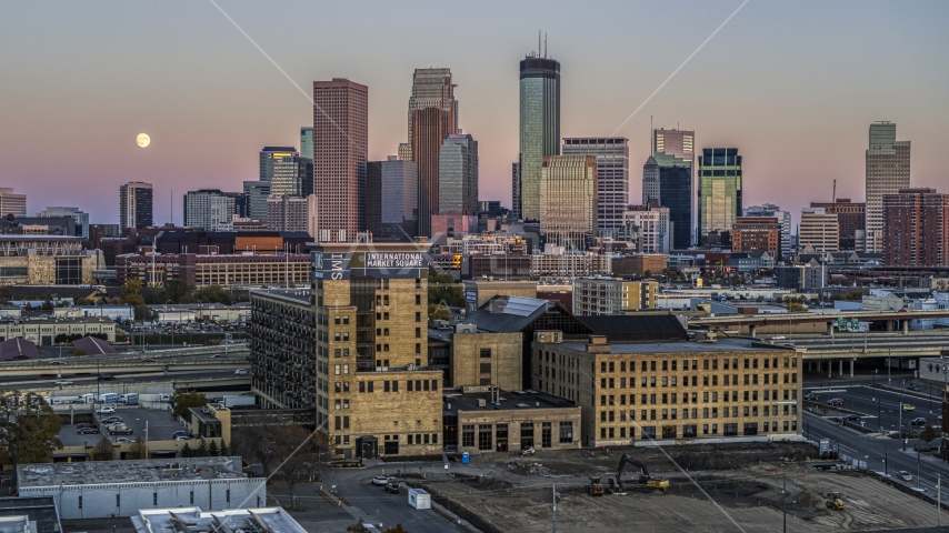 The city's skyline behind a market at sunset in Downtown Minneapolis, Minnesota Aerial Stock Photo DXP001_000327 | Axiom Images