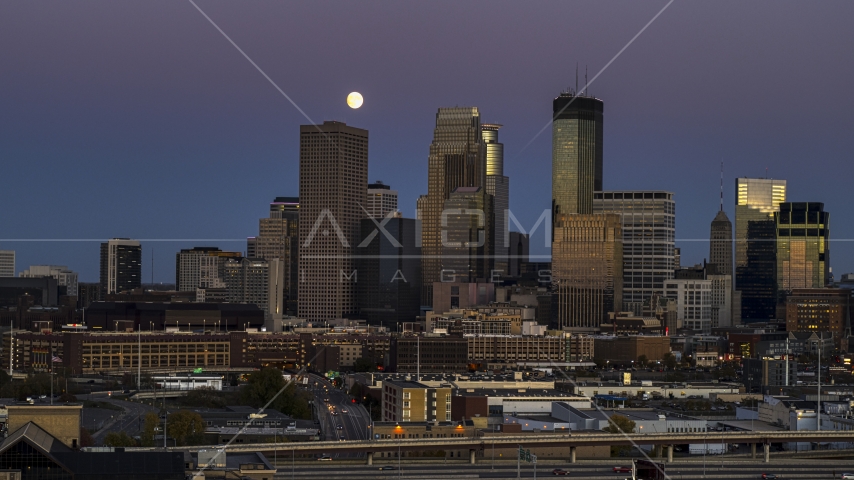 The moon above giant skyscrapers of the city's skyline at twilight, Downtown Minneapolis, Minnesota Aerial Stock Photo DXP001_000336 | Axiom Images