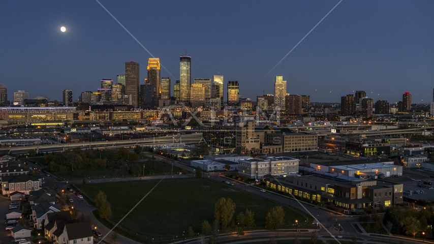 The city's skyline at twilight with the moon in the sky, Downtown Minneapolis, Minnesota Aerial Stock Photo DXP001_000348 | Axiom Images
