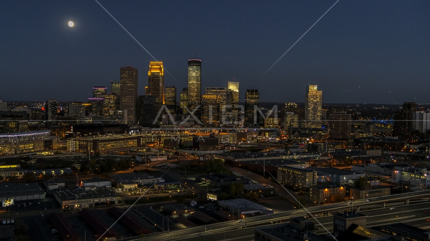 The downtown skyline at twilight with the moon in the sky, Downtown Minneapolis, Minnesota Aerial Stock Photo DXP001_000350 | Axiom Images