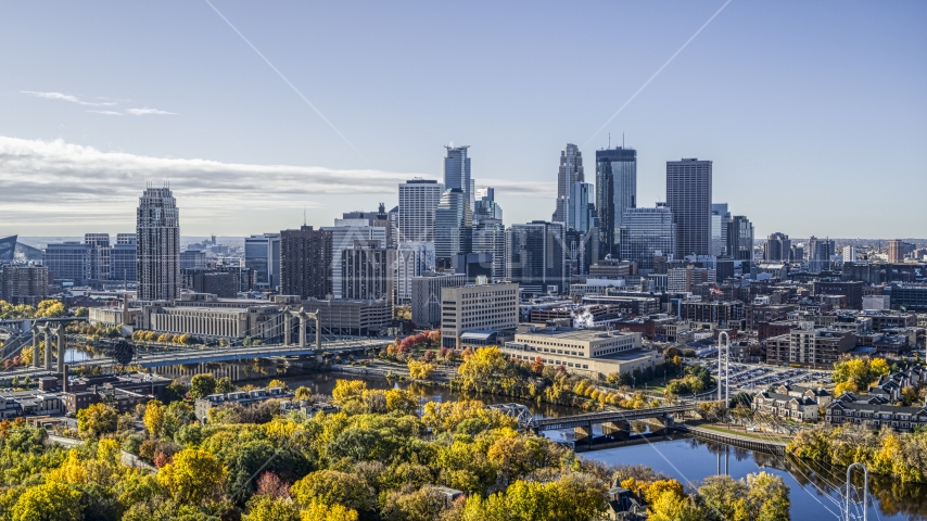 Bridges spanning the Mississippi River, and city skyline in background, Downtown Minneapolis, Minnesota Aerial Stock Photo DXP001_000369 | Axiom Images