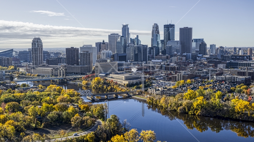 Bridges spanning the Mississippi River, and city skyline in distance, Downtown Minneapolis, Minnesota Aerial Stock Photo DXP001_000370 | Axiom Images