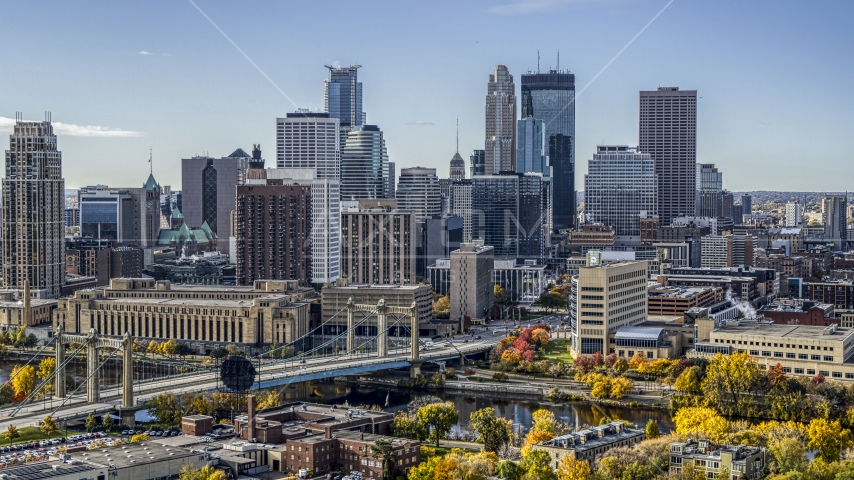 Hennepin Avenue Bridge spanning the river, and the city skyline, Downtown Minneapolis, Minnesota Aerial Stock Photo DXP001_000371 | Axiom Images
