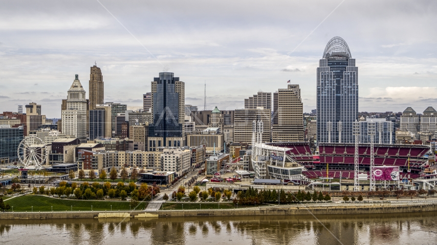The city's skyline and baseball stadium seen from the Ohio River, Downtown Cincinnati, Ohio Aerial Stock Photo DXP001_000449 | Axiom Images