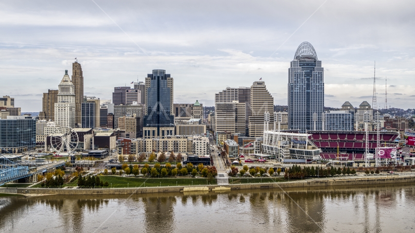 The city's skyline and baseball stadium beside the Ohio River, Downtown Cincinnati, Ohio Aerial Stock Photo DXP001_000450 | Axiom Images