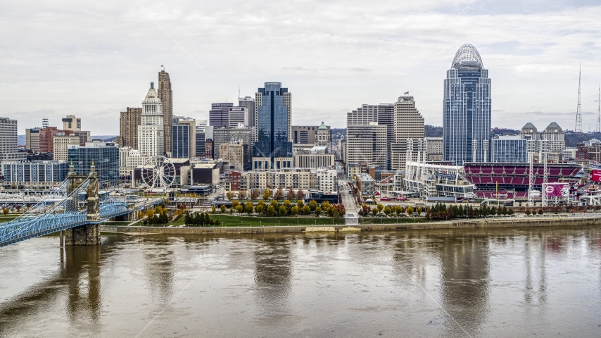 City skyline behind the baseball stadium by the Ohio River in Downtown Cincinnati, Ohio Aerial Stock Photo DXP001_000461 | Axiom Images