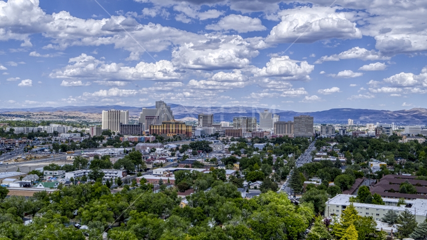 The city's skyline seen from west of the city in Reno, Nevada Aerial Stock Photo DXP001_004_0007 | Axiom Images