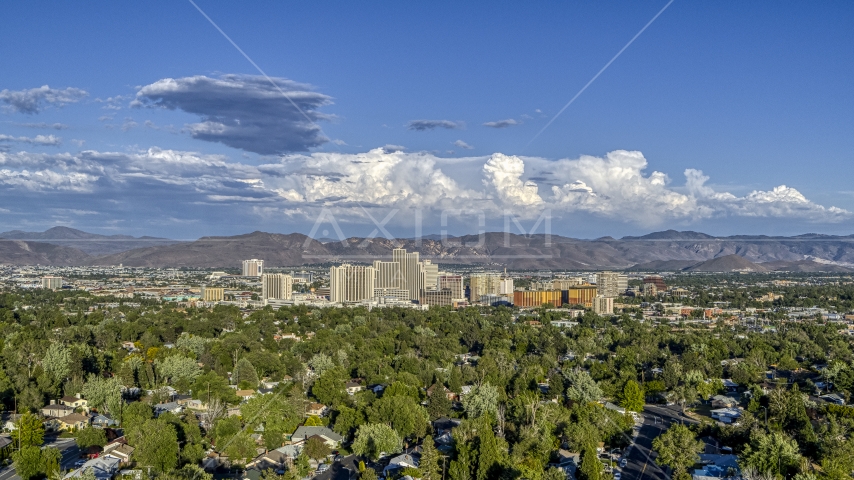 The city skyline seen from tree-lined neighborhoods in Reno, Nevada Aerial Stock Photo DXP001_005_0004 | Axiom Images