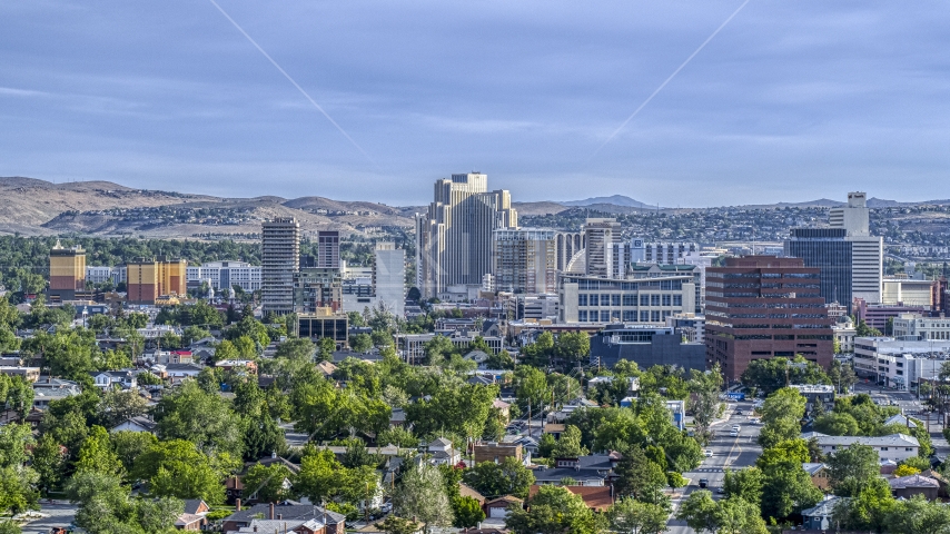 High-rise casino resorts and office buildings seen from neighborhoods in Reno, Nevada Aerial Stock Photo DXP001_006_0013 | Axiom Images