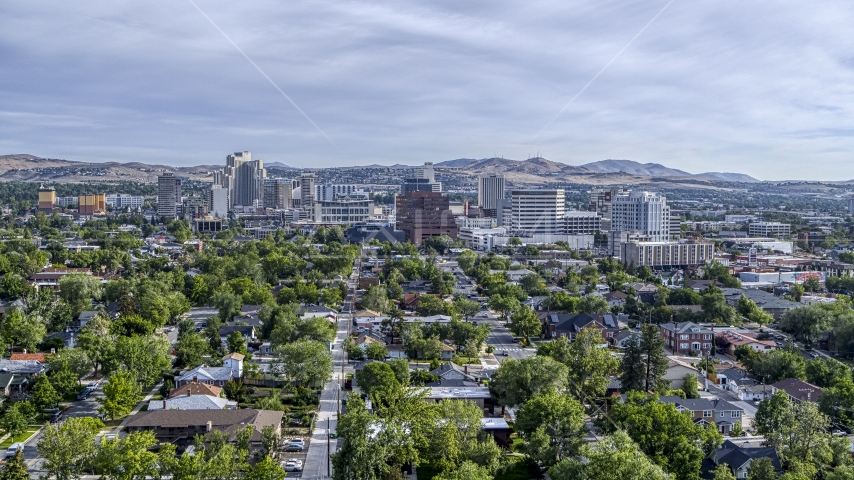 A wide view of high-rise casino resorts and office buildings seen from a neighborhood in Reno, Nevada Aerial Stock Photo DXP001_006_0014 | Axiom Images
