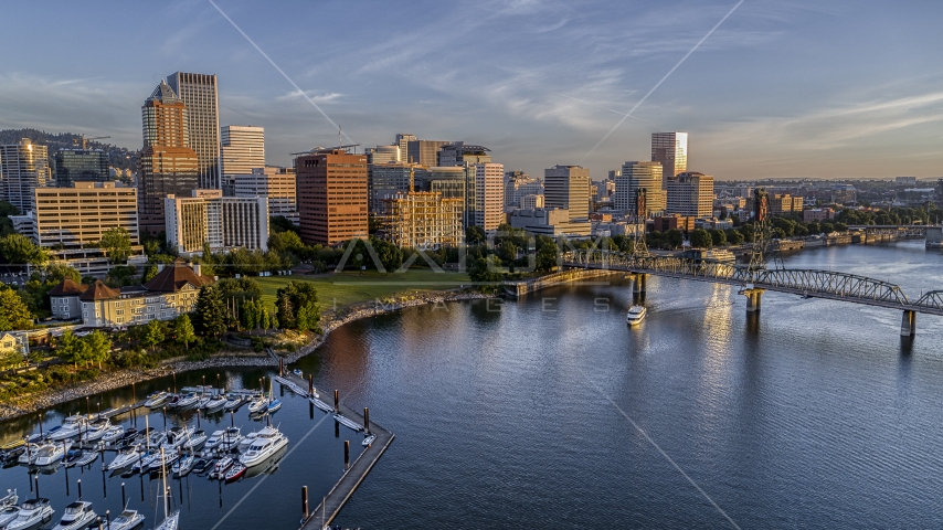 The city skyline and the Hawthorne Bridge seen from over the Willamette River, Downtown Portland, Oregon Aerial Stock Photo DXP001_010_0011 | Axiom Images