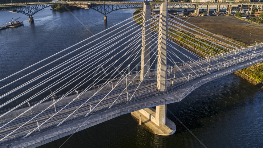 The Tilikum Crossing Bridge with no traffic spanning the Willamette River, South Portland, Oregon Aerial Stock Photo DXP001_010_0015 | Axiom Images