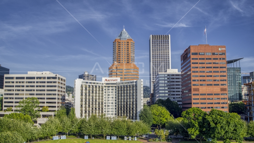 Hotel flanked by office buildings, tall skyscrapers in background, Downtown Portland, Oregon Aerial Stock Photo DXP001_011_0008 | Axiom Images