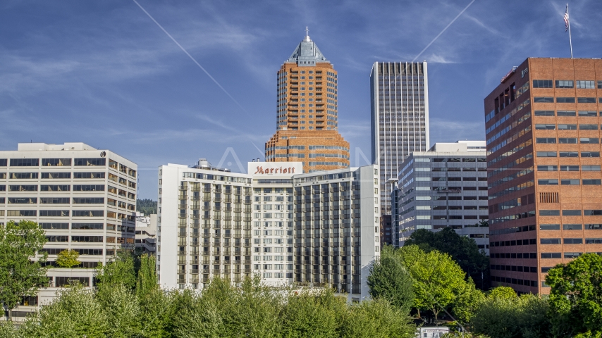 Hotel with tall skyscrapers in background, Downtown Portland, Oregon Aerial Stock Photo DXP001_011_0009 | Axiom Images