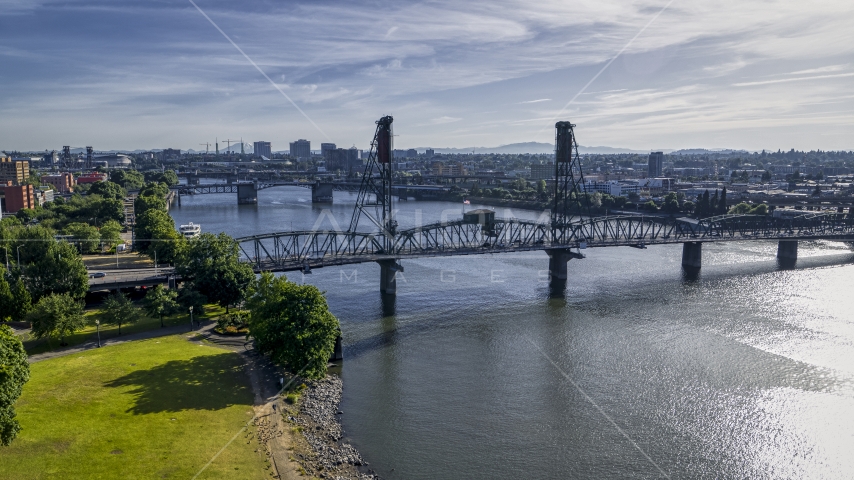 The Hawthorne Bridge spanning the Willamette River in Downtown Portland, Oregon Aerial Stock Photo DXP001_011_0017 | Axiom Images
