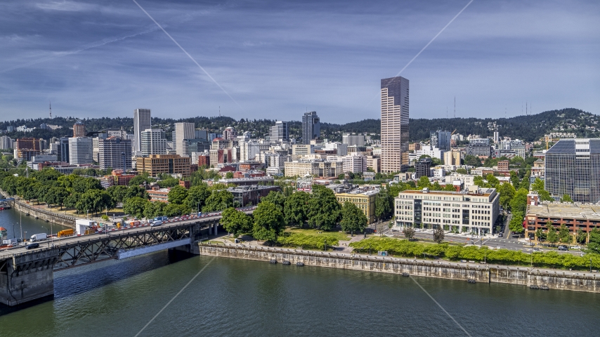 Downtown Portland seen from across the Willamette River near the Burnside Bridge, Oregon Aerial Stock Photo DXP001_012_0003 | Axiom Images