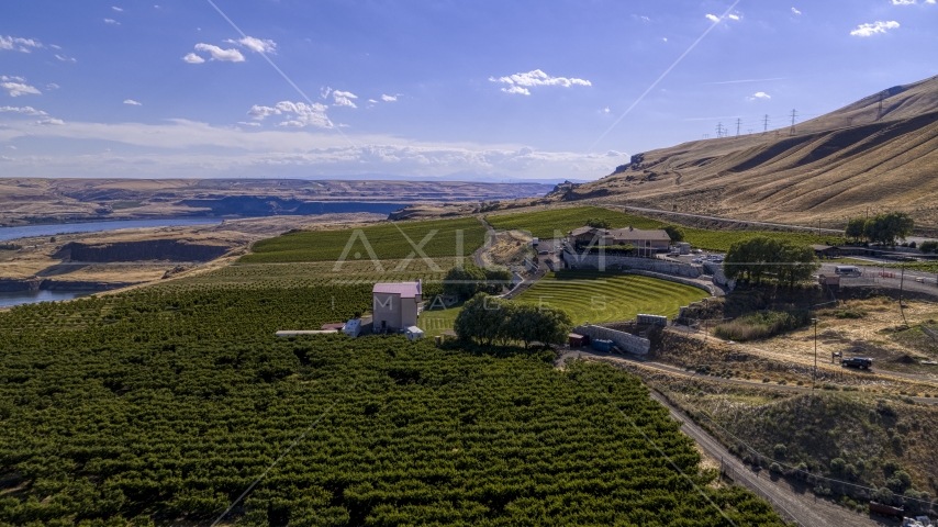 Grapevines and the Maryhill Winery in Goldendale, Washington Aerial Stock Photo DXP001_018_0011 | Axiom Images