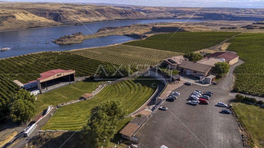 The Maryhill Winery, amphitheater, and vineyards beside the Columbia River in Goldendale, Washington Aerial Stock Photo DXP001_018_0019 | Axiom Images