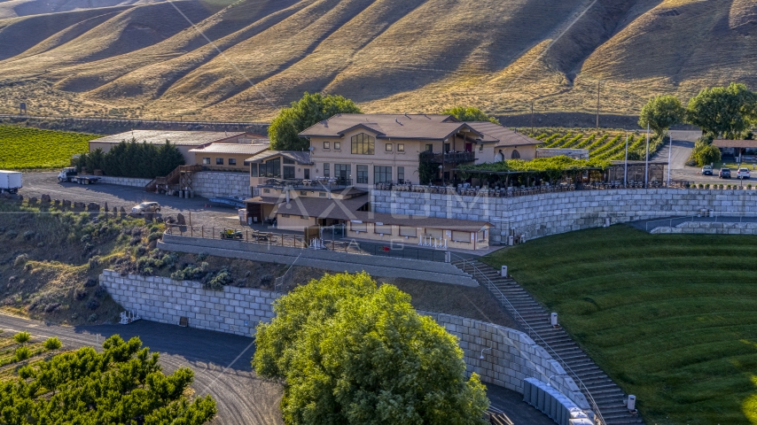 A close-up view of the Maryhill Winery building in Goldendale, Washington Aerial Stock Photo DXP001_019_0001 | Axiom Images