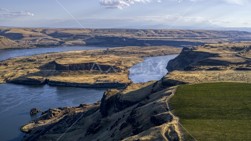 Miller Island and the Columbia River seen from cliff by Maryhill Winery in Goldendale, Washington Aerial Stock Photo DXP001_019_0023 | Axiom Images