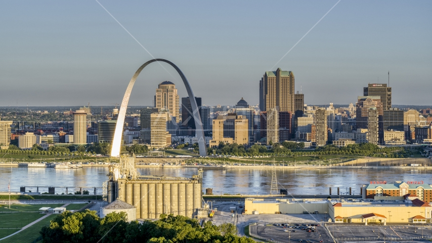The Arch and skyline, seen from a casino by the Mississippi River, sunrise, Downtown St. Louis, Missouri Aerial Stock Photo DXP001_021_0002 | Axiom Images