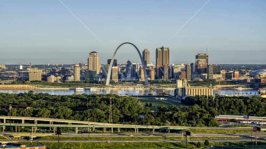A view from the interstate of the Arch and skyline, sunrise, Downtown St. Louis, Missouri Aerial Stock Photo DXP001_021_0007 | Axiom Images