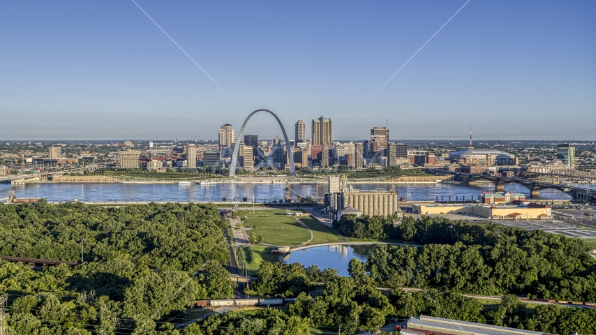 A park and the St. Louis skyline across Mississippi River,Downtown St. Louis, Missouri Aerial Stock Photo DXP001_022_0001 | Axiom Images